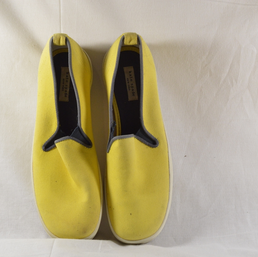 Kate Spade New York yellow slip on shoes